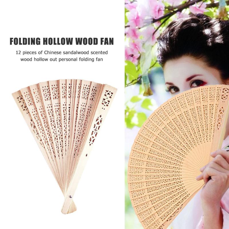 12pcs Sandalwood Wooden Fans Hand Held Scented Hollow Folding Fans Dancing Decoration Chinese Style Female Crafts
12pcs Sandalwood Wooden Fans Hand Held Scented Hollow Folding Fans Dancing Decoration Chinese Style Female Crafts