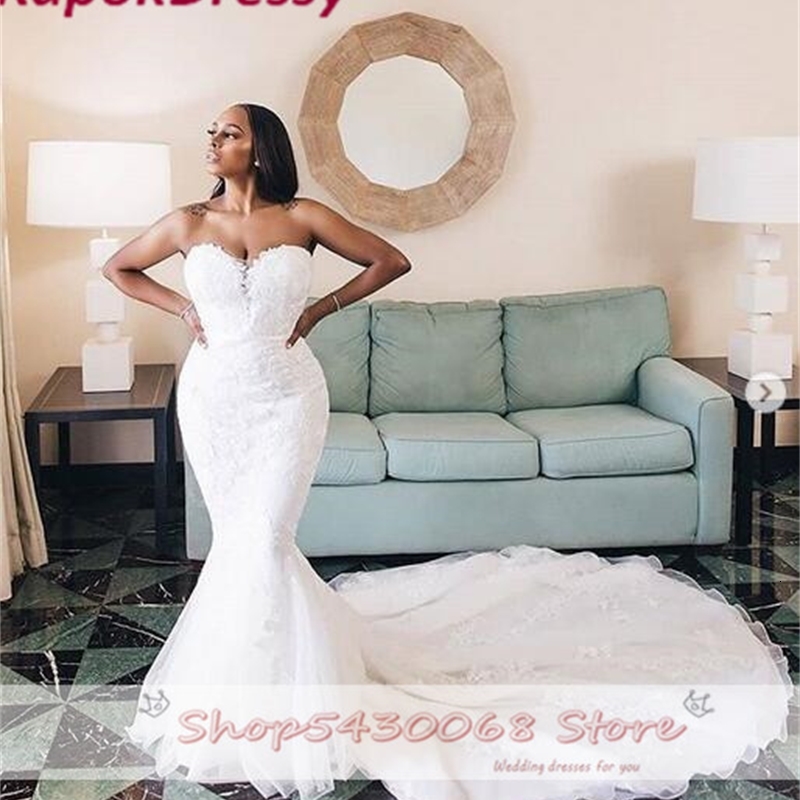 2021 New South African Mermaid Wedding Gowns Dear Strapless Dress Sweeping Tulle Train Lace Applications Plus Size Bride UVXX, Champagne
2021 New South African Mermaid Wedding Gowns Dear Strapless Dress Sweeping Tulle Train Lace Applications Plus Size Bride UVXX, Champagne