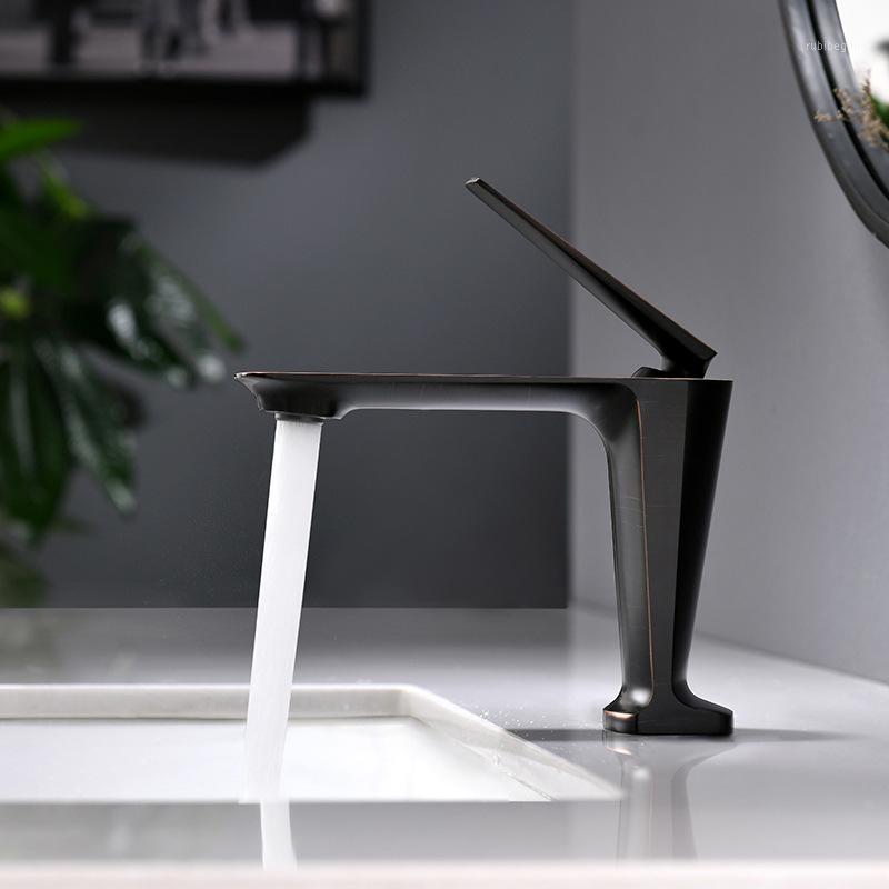 Modern Simplicity Bathroom Faucet Wash Basin Sink Tap Deck Mounted Solid Brass Mixer Tap Faucet1
Modern Simplicity Bathroom Faucet Wash Basin Sink Tap Deck Mounted Solid Brass Mixer Tap Faucet1