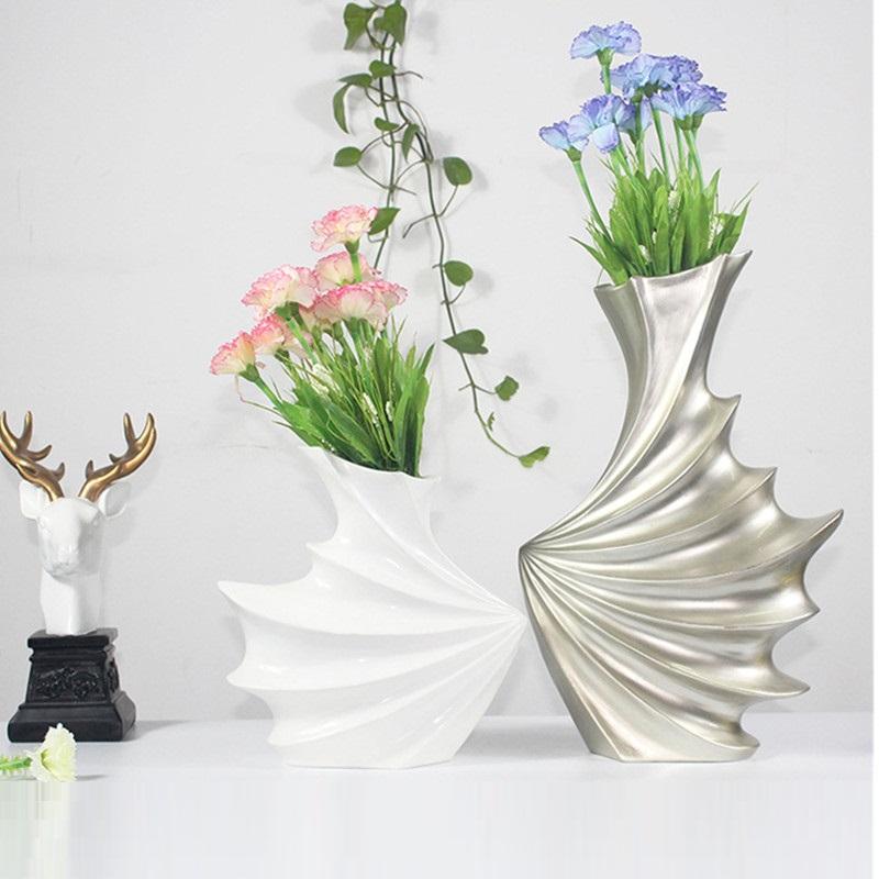 Modern Simple Abstraction Geometry Resin Vase Creative Living Room Coffee Table Desktop Flower Arrangement Vase X4907
Modern Simple Abstraction Geometry Resin Vase Creative Living Room Coffee Table Desktop Flower Arrangement Vase X4907