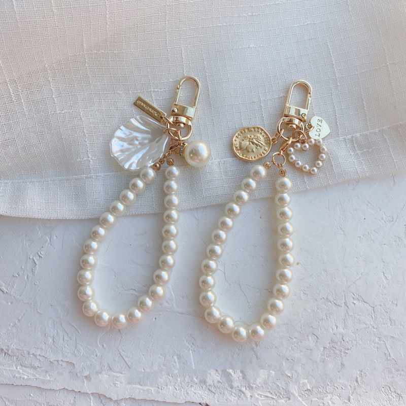 Fashion Designer Keychain Pearl Car Key Chain High Quality Alloy Shell Pendant Buckle Personalized Keychain Fashion Bags Pendant
Fashion Designer Keychain Pearl Car Key Chain High Quality Alloy Shell Pendant Buckle Personalized Keychain Fashion Bags Pendant