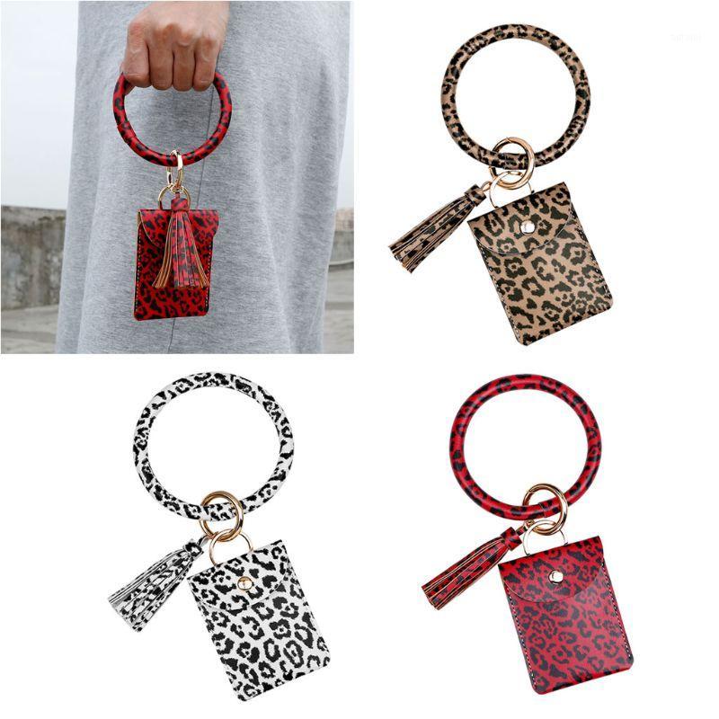 3 Pcs Leopard Print Keychain Bracelet PU Leather Wristlet Coin Purse Fashion Card Key Holder Kit with Tassel for Women1
3 Pcs Leopard Print Keychain Bracelet PU Leather Wristlet Coin Purse Fashion Card Key Holder Kit with Tassel for Women1