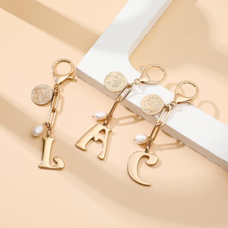 Trendy Initial Keychain 26 Alphabet Letter Key Chain Natural Freshwater Pearl Charm Copper Coin Pendant Keyring1
Trendy Initial Keychain 26 Alphabet Letter Key Chain Natural Freshwater Pearl Charm Copper Coin Pendant Keyring1