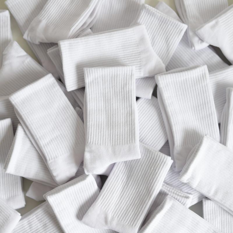 Socks women's medium and high socks autumn and winter short black cotton white stockings men's trend
Socks women's medium and high socks autumn and winter short black cotton white stockings men's trend