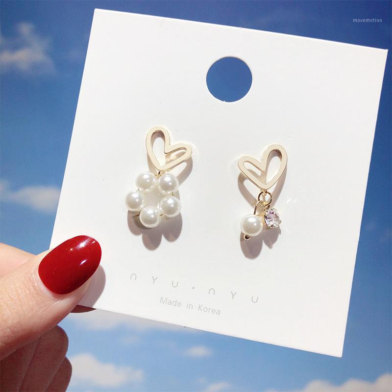 Sweet retro High-End Hollow Love Simulation Pearl Heart-Shaped Asymmetric Earrings Fashion Wild Simple Accessories1
Sweet retro High-End Hollow Love Simulation Pearl Heart-Shaped Asymmetric Earrings Fashion Wild Simple Accessories1