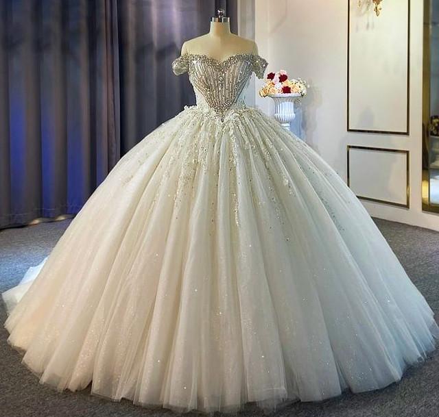 2022 Sparkly Beaded A Line Wedding Gowns Off Shoulder Plus Size Sweep Train Real Image 3D Floral Lace Bridal Party Dresses For Arabic Women Vestidos De Novia, Ivory
2022 Sparkly Beaded A Line Wedding Gowns Off Shoulder Plus Size Sweep Train Real Image 3D Floral Lace Bridal Party Dresses For Arabic Women Vestidos De Novia, Ivory