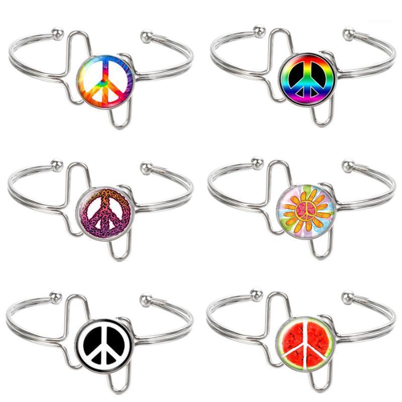 Planted silver color/golden Cuff Bracelets Glass Cabochon Peace Symbol sign Bangle Bracelet For Women jewelry Gift ZB0313/03141
Planted silver color/golden Cuff Bracelets Glass Cabochon Peace Symbol sign Bangle Bracelet For Women jewelry Gift ZB0313/03141