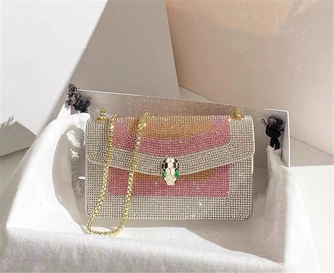 Beautiful enamel snake head organ bag with contrast color and diamond inlaid style women's Fashion Shoulder Bag high quality chain bag
Beautiful enamel snake head organ bag with contrast color and diamond inlaid style women's Fashion Shoulder Bag high quality chain bag