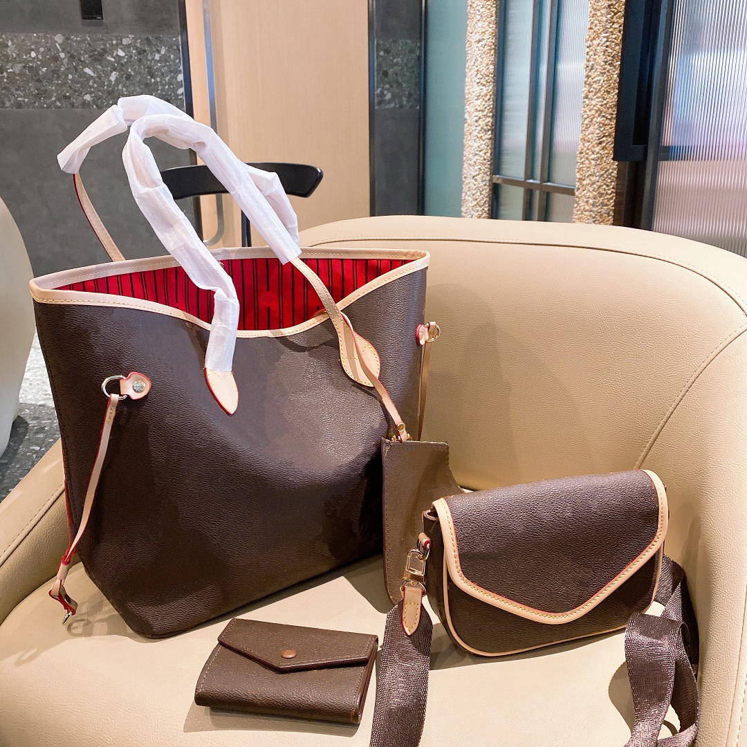 Women's large capacity shopping bag 21 new designer retro letter handbag fashion with straddle Pouch Wallet 3-piece set WF2101301
Women's large capacity shopping bag 21 new designer retro letter handbag fashion with straddle Pouch Wallet 3-piece set WF2101301