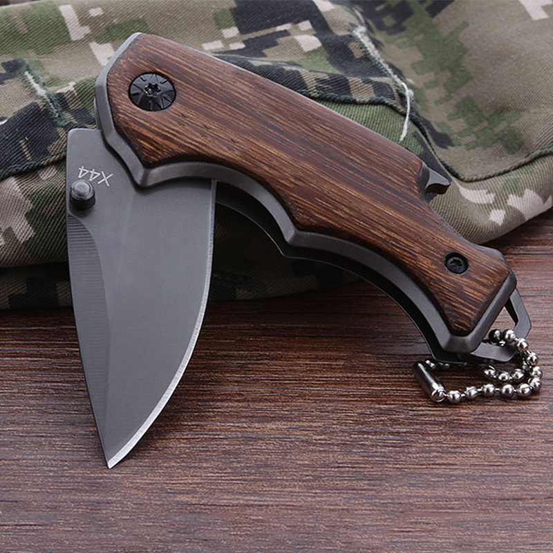X44 Small Folding Knife Wood Outdoor Camping Hunting Knife KeyChain Pocket Knife EDC Tools Free Shipping
X44 Small Folding Knife Wood Outdoor Camping Hunting Knife KeyChain Pocket Knife EDC Tools Free Shipping