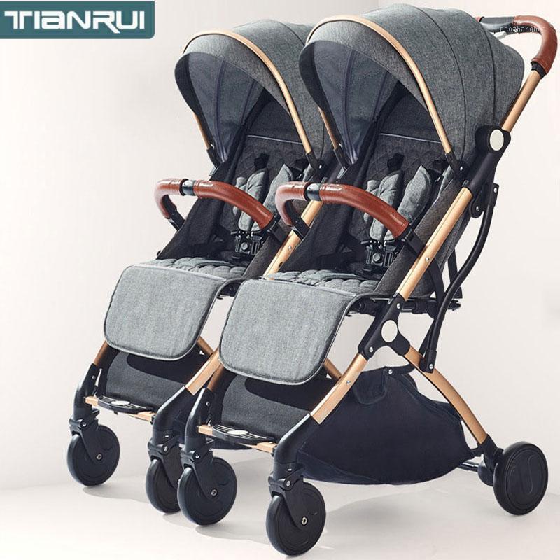 TianRui stroller for twins baby stroller folding portable trolley double on the plane1
TianRui stroller for twins baby stroller folding portable trolley double on the plane1