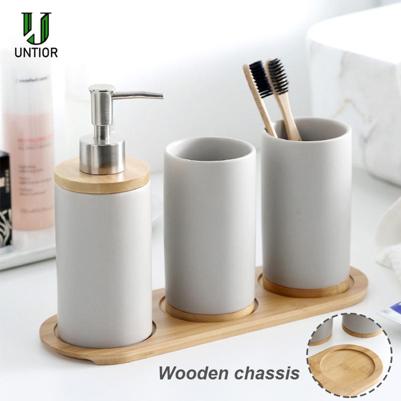 UNTIOR Ceramic Bathroom Accessories Set with Bamboo Base Include Ceramic Tumbler Soap Dispenser Toothbrush holder Bathroom Set
UNTIOR Ceramic Bathroom Accessories Set with Bamboo Base Include Ceramic Tumbler Soap Dispenser Toothbrush holder Bathroom Set
