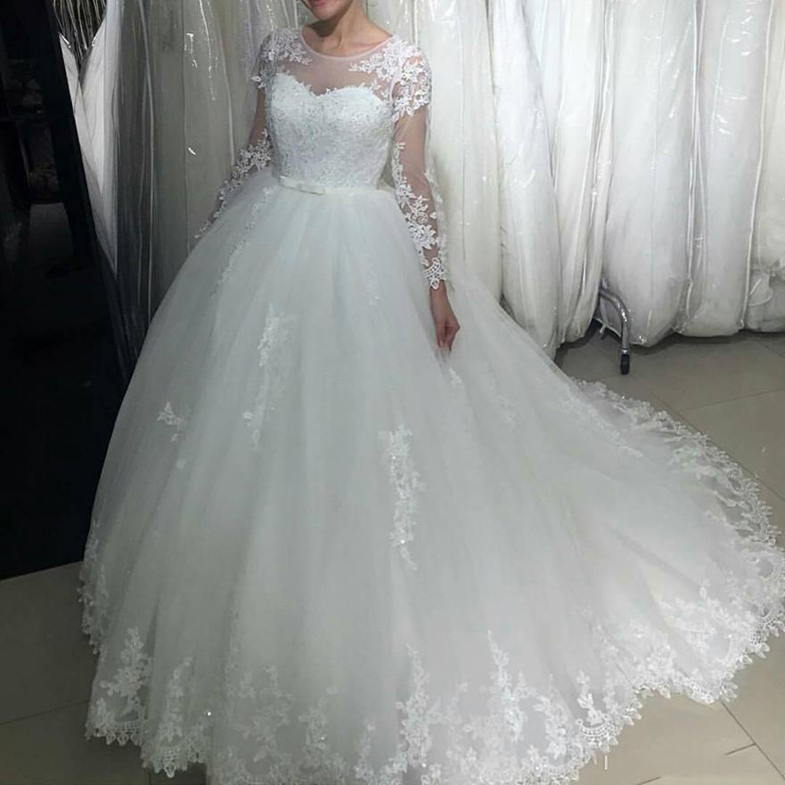 Custom Arabic Long Sleeves Lace Ball Gown Wedding Dresses Jewel Neck Appliqued Beads Sash Tulle Sweep Train Wedding Bridal Gowns, White
Custom Arabic Long Sleeves Lace Ball Gown Wedding Dresses Jewel Neck Appliqued Beads Sash Tulle Sweep Train Wedding Bridal Gowns, White