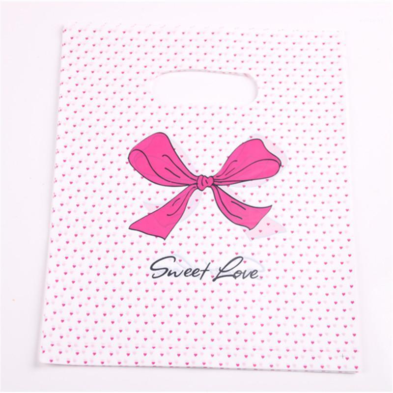 Gift Wrap Design Wholesale 100pcs/lot 20*25cm Pink Sweet Love Packaging Bags For T-shirt Plastic Shopping With Dot Bow1
Gift Wrap Design Wholesale 100pcs/lot 20*25cm Pink Sweet Love Packaging Bags For T-shirt Plastic Shopping With Dot Bow1