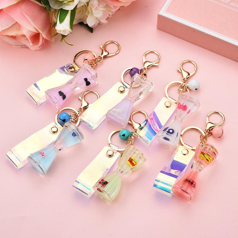 Keychains Uicksand Floating Marine Doll Hourglass Keychain Liquid Into Oil Drum Drift Bottle Couple Bag Pendant Fashion
Keychains Uicksand Floating Marine Doll Hourglass Keychain Liquid Into Oil Drum Drift Bottle Couple Bag Pendant Fashion