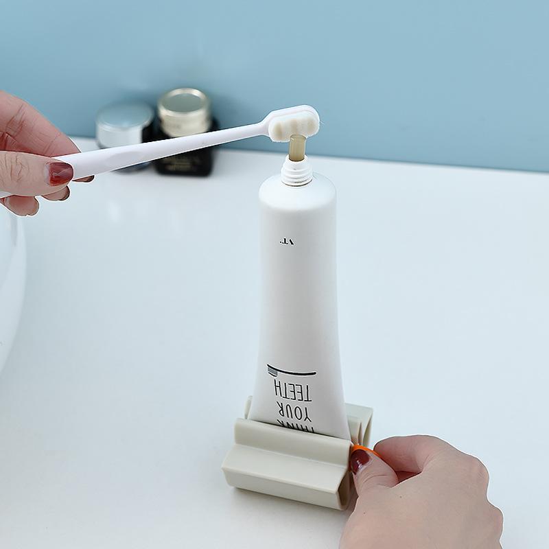 New Bathroom Accessories Toothpaste Squeezer Tooth Paste Dispenser Holder Tube Squeezer Facial Cleanser Press Rolling Holder for Kids