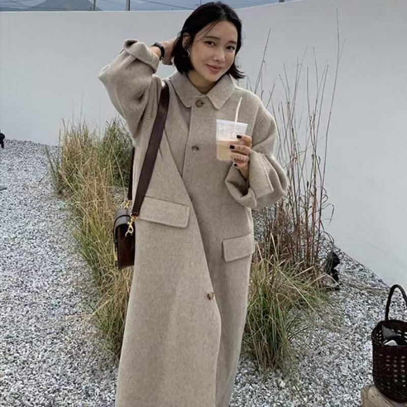 Oatmeal color hand sewing double-sided cashmere wool coat female 2020 new long over-the-knee loose cloth coat, Black
Oatmeal color hand sewing double-sided cashmere wool coat female 2020 new long over-the-knee loose cloth coat, Black