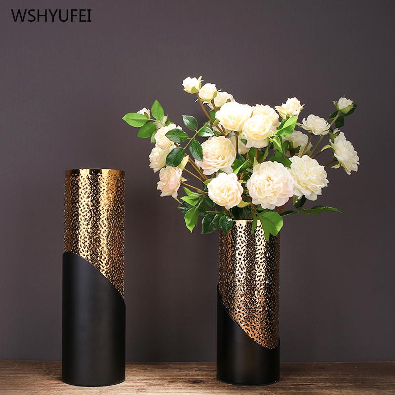 Creative light luxury metal gold hollow cylindrical ceramic vase simple flower arrangement hotel model art decoration ornaments
Creative light luxury metal gold hollow cylindrical ceramic vase simple flower arrangement hotel model art decoration ornaments