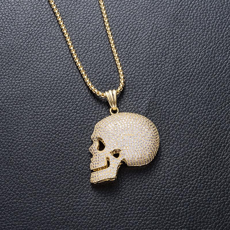 Hip Hop CZ Stone Paved Bling Out Gold Color Skull Pendants Necklace for Men Rapper Jewelry Drop Shipping
Hip Hop CZ Stone Paved Bling Out Gold Color Skull Pendants Necklace for Men Rapper Jewelry Drop Shipping