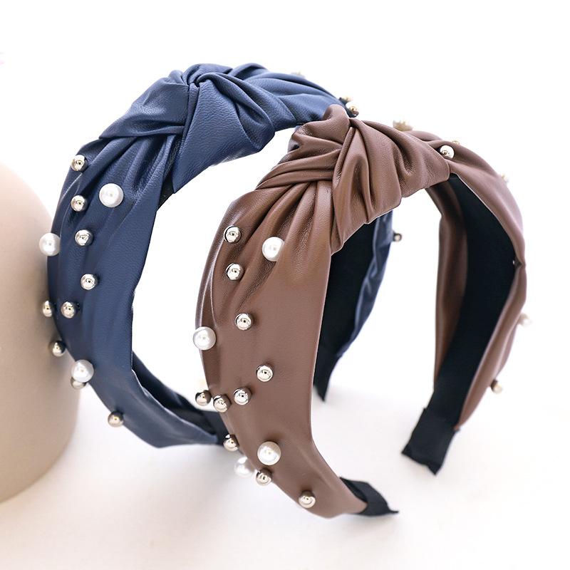 Pu Leather Knot Hairband With Pearl Beads Knotted Headband for Women Girls Hair Accessories
Pu Leather Knot Hairband With Pearl Beads Knotted Headband for Women Girls Hair Accessories