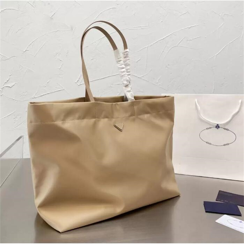 Luxury Designers Handbags Women Tote Bags Large Capacity Wallets Nylon with Tag Triangle Shoulder HandBag High Quality Shopping Bag, Black
Luxury Designers Handbags Women Tote Bags Large Capacity Wallets Nylon with Tag Triangle Shoulder HandBag High Quality Shopping Bag, Black