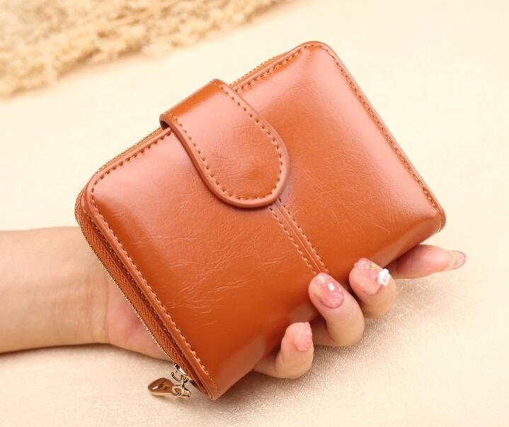 Popular new wallet women's short leather wallet wax leather handbag oil leather CAM bag, Brown
Popular new wallet women's short leather wallet wax leather handbag oil leather CAM bag, Brown