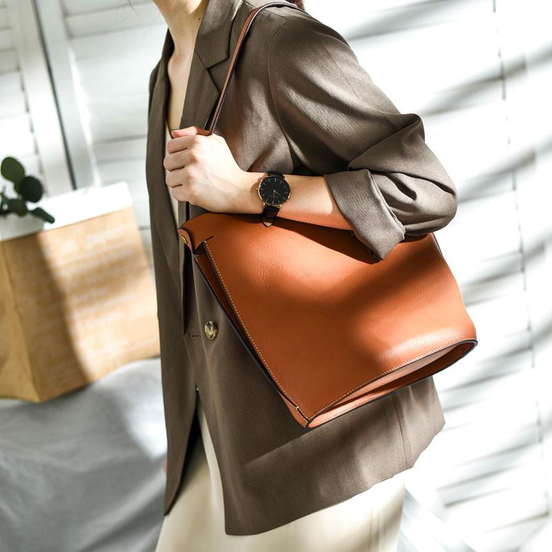 Simple personality women's genuine leather shoulder bag bucket bag top layer cowhide large capacity vintage messenger handbag, Black
Simple personality women's genuine leather shoulder bag bucket bag top layer cowhide large capacity vintage messenger handbag, Black