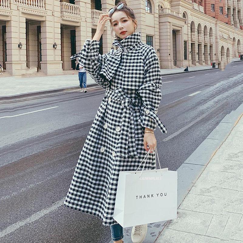 Plaid woolen coat women' middle long winter 2020 new Korean loose thickened temperament woolen coat, Black and white
Plaid woolen coat women' middle long winter 2020 new Korean loose thickened temperament woolen coat, Black and white