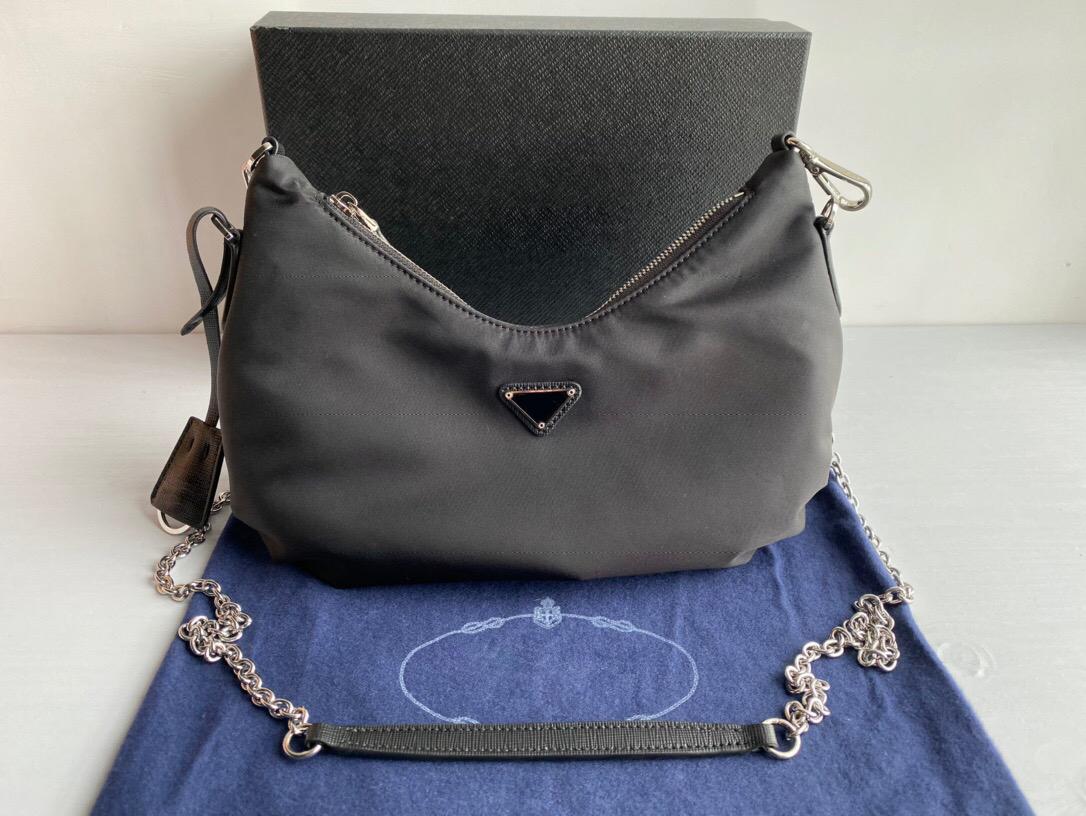 5A Women's Top Bags New 2021 Mens Crossbody 2006 Bag Shoulder Fashion Leather Designer Nylon Tote Reedition Quality Handba Awubf, Red;black
5A Women's Top Bags New 2021 Mens Crossbody 2006 Bag Shoulder Fashion Leather Designer Nylon Tote Reedition Quality Handba Awubf, Red;black