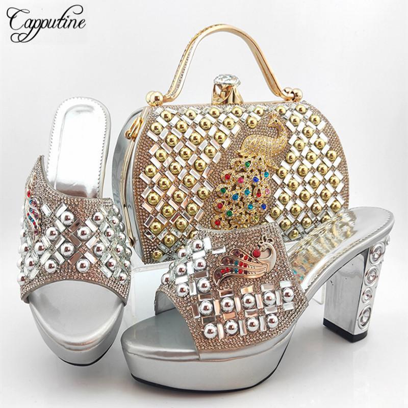 Nigerian Style Rivet Decoration Shoes And Bag Set African Ladies Silver Color Pumps 10.5CM Shoes And Bag Set For Wedding Party1, Black
Nigerian Style Rivet Decoration Shoes And Bag Set African Ladies Silver Color Pumps 10.5CM Shoes And Bag Set For Wedding Party1, Black