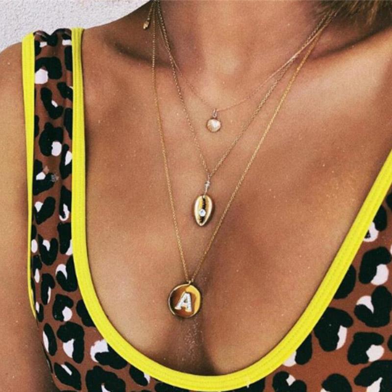 Miss JQ New Gold Letter A inlaid Crystal Multi-layer Pendant Necklace for Women Bohemian Creative Alloy Seashell Necklace
Miss JQ New Gold Letter A inlaid Crystal Multi-layer Pendant Necklace for Women Bohemian Creative Alloy Seashell Necklace