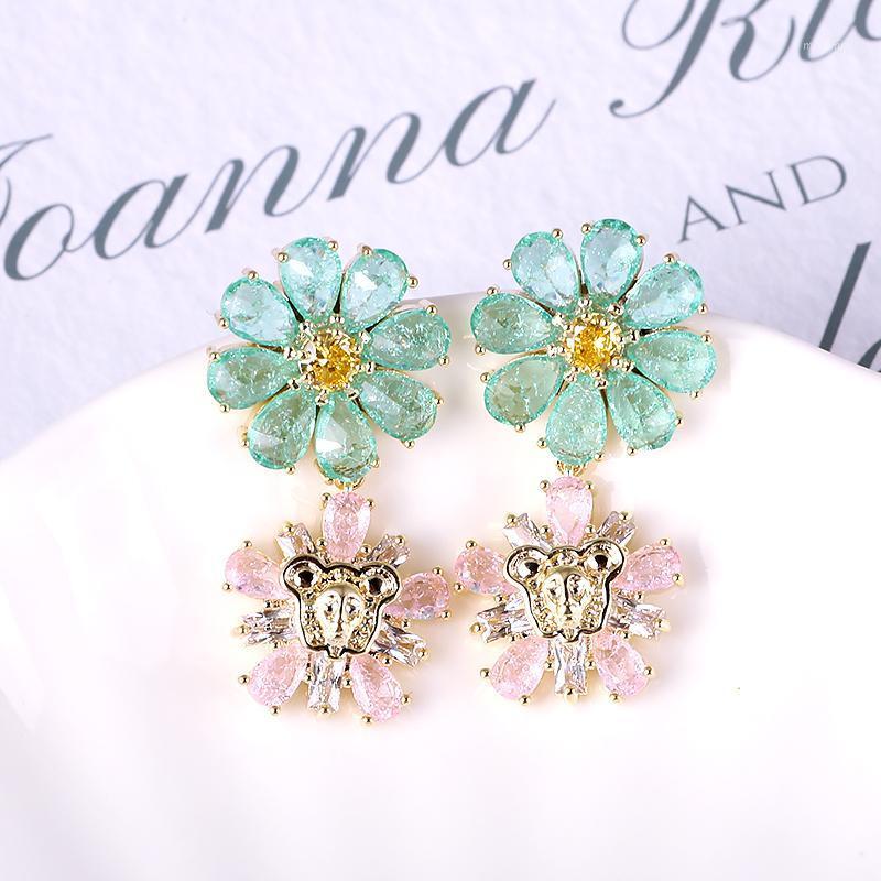 XIUMEIYIZU Fashion Stone Flower Earrings Hollow Brass Plating Pave CZ Stone Jewelry Post Plating Bride Women Wedding Earring1
XIUMEIYIZU Fashion Stone Flower Earrings Hollow Brass Plating Pave CZ Stone Jewelry Post Plating Bride Women Wedding Earring1