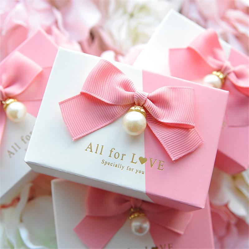 Pearl ribbon bowknot Wedding Birthday Guests Event party pink Candy box baby shower Party Supplies Bomboniere1
Pearl ribbon bowknot Wedding Birthday Guests Event party pink Candy box baby shower Party Supplies Bomboniere1