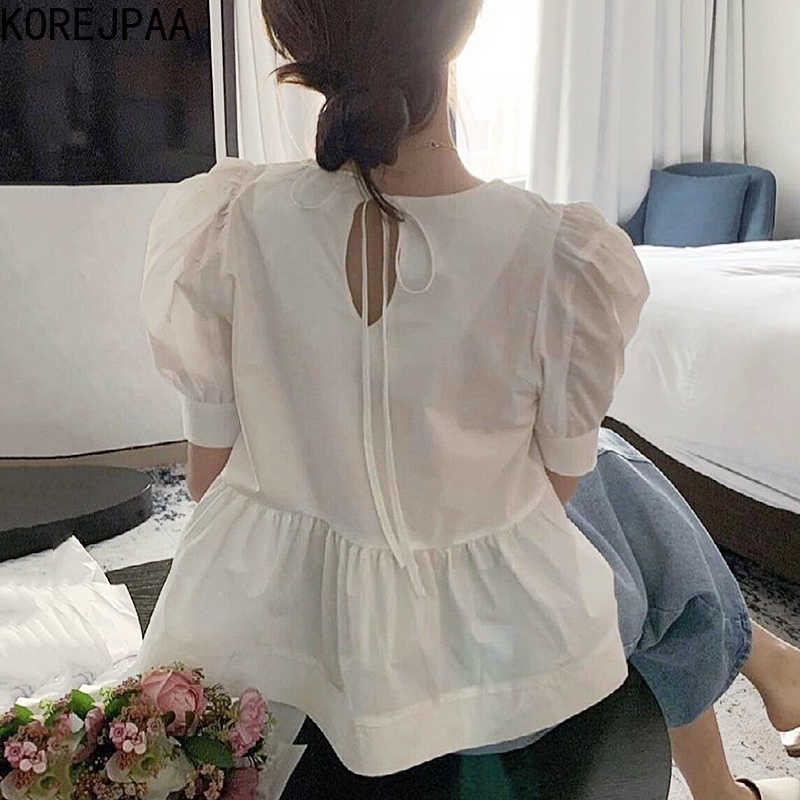 Korejpaa Women Shirt Summer Korean Chic Ladies Simple Round Neck Back Hollow Tie Wide Pine Hem Puff Sleeve Doll Blouses 210526