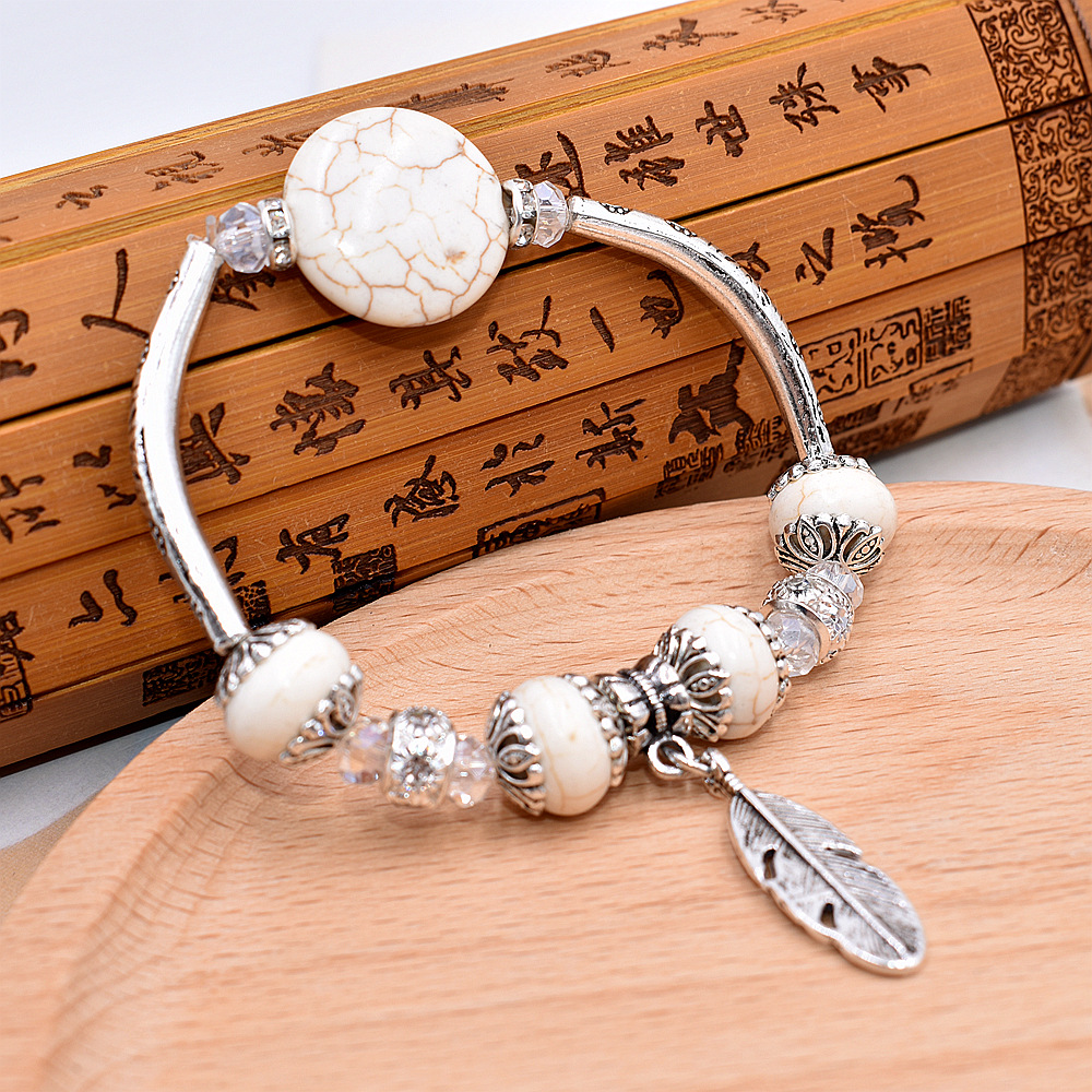 National Style Strands Turquoises Natural Stone Bracelets Alloy Leaf Pendant FLower Decration Charm Jewelry Bracelet Bangle for Girl
National Style Strands Turquoises Natural Stone Bracelets Alloy Leaf Pendant FLower Decration Charm Jewelry Bracelet Bangle for Girl