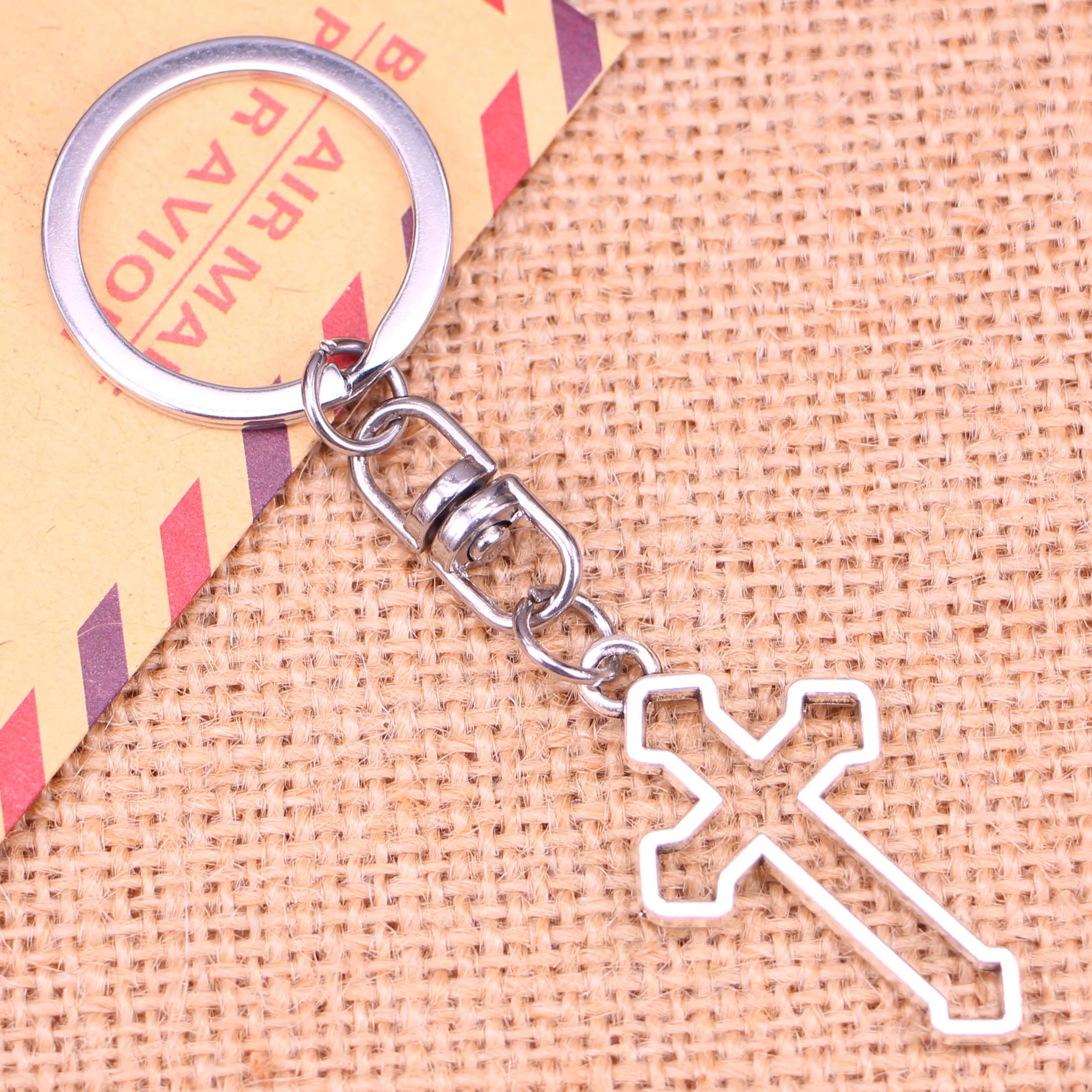 20pcs New Fashion Keychain 38*22 mm hollow cross Pendants DIY Men Jewelry Car Key Chain Ring Holder Souvenir For Gift
20pcs New Fashion Keychain 38*22 mm hollow cross Pendants DIY Men Jewelry Car Key Chain Ring Holder Souvenir For Gift