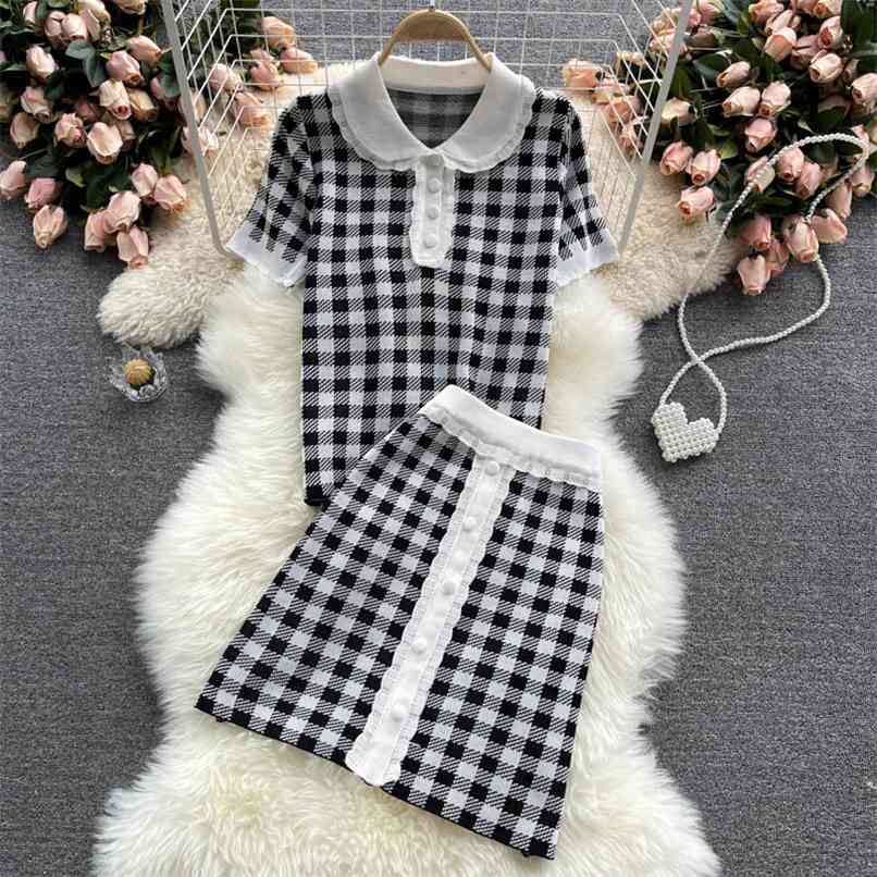 Summer Fashion Black/Purple Plaid Knitted Suits Women Peter pan collar Short Sleeve Sweater + Mini Skirt 2 Piece Sets 210602
Summer Fashion Black/Purple Plaid Knitted Suits Women Peter pan collar Short Sleeve Sweater + Mini Skirt 2 Piece Sets 210602