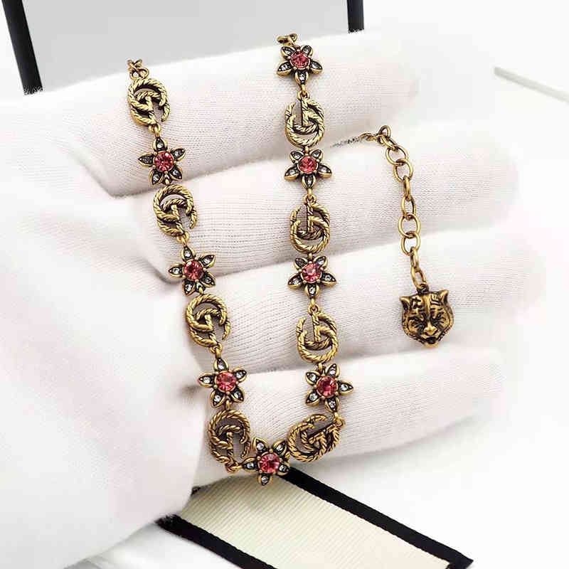 76% OFF designer jewelry Red Diamond Flower crack tiger head double Necklace women's trend old fashion clavicle chain
76% OFF designer jewelry Red Diamond Flower crack tiger head double Necklace women's trend old fashion clavicle chain