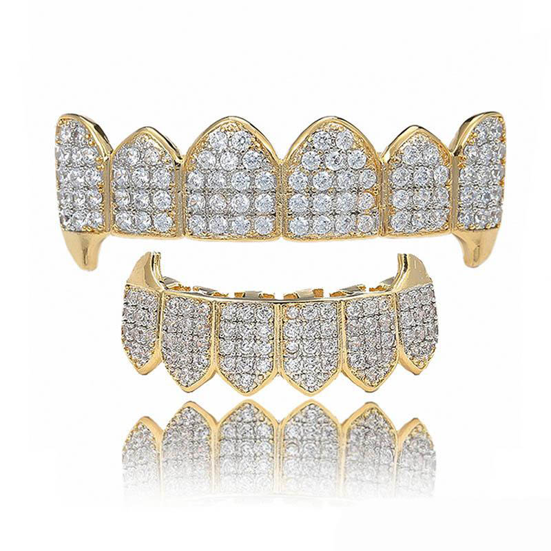 Shining Hip Hop Grillz Iced Out CZ Fang Mouth teeth grills Caps Top & Bottom tooth Set Men Women Vampire Grills Fashion Jewelry
Shining Hip Hop Grillz Iced Out CZ Fang Mouth teeth grills Caps Top & Bottom tooth Set Men Women Vampire Grills Fashion Jewelry