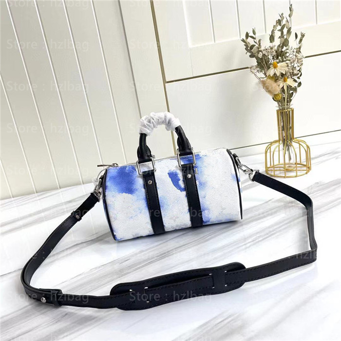 KEEPALL XS mens bag Ink Watercolor navy blue Shoulder Bags leather Mono gram print Cross Body Cowhide leather Luxurys toes bag M57844
KEEPALL XS mens bag Ink Watercolor navy blue Shoulder Bags leather Mono gram print Cross Body Cowhide leather Luxurys toes bag M57844