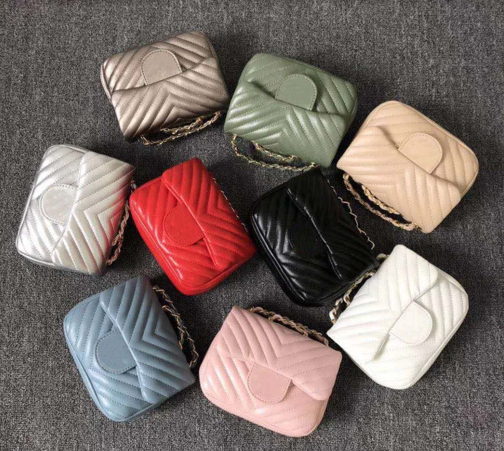 Children designer handbags girls letter printed change purse Europe style kids PU stripe print one shoulder bag fashion accessories pocket wallet F536, Black
Children designer handbags girls letter printed change purse Europe style kids PU stripe print one shoulder bag fashion accessories pocket wallet F536, Black