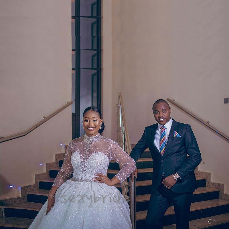 2021 Luxury African Ball Gown Wedding Dresses Major Beading Beads Long Sleeve High Neck Crystals Belt Wedding Dress Bridal Gowns