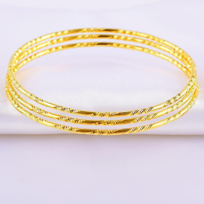 Bangle Classic Thin Yellow Gold Filled Stylish Womens Bracelet Screw Carved Pattern Diameter 65mm 2.56"1
Bangle Classic Thin Yellow Gold Filled Stylish Womens Bracelet Screw Carved Pattern Diameter 65mm 2.56"1