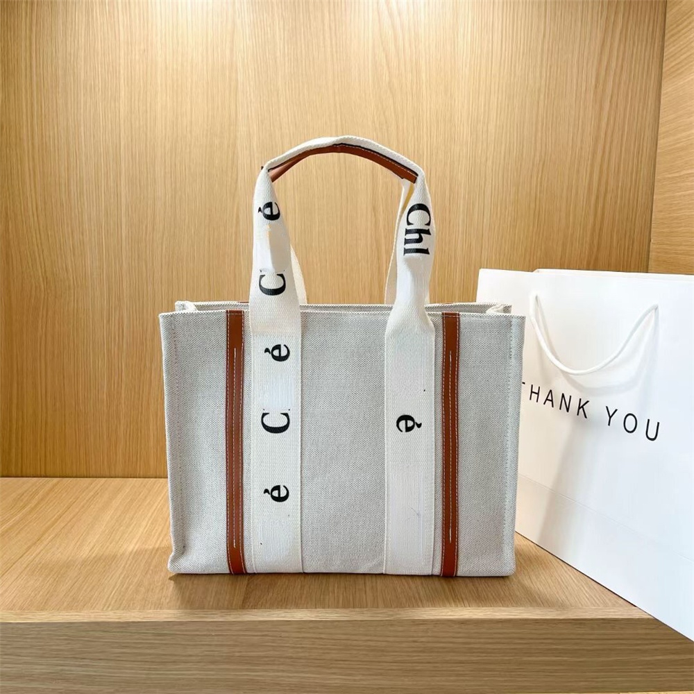 Shoulder Bags Designer Letter Print Stripe Large Capacity Tote Bag Canvas Female Japanese Casual Handbags
Shoulder Bags Designer Letter Print Stripe Large Capacity Tote Bag Canvas Female Japanese Casual Handbags