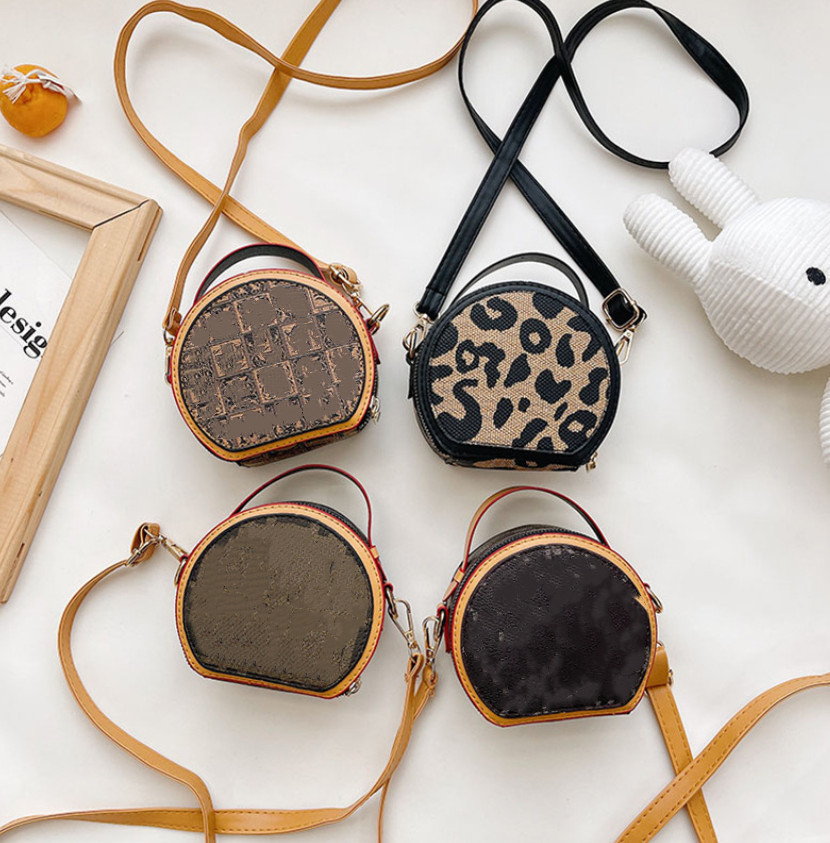 Designer girls shell handbag children letter printed messenger bags kids circular single shoulder princess bag A8004, Nk
Designer girls shell handbag children letter printed messenger bags kids circular single shoulder princess bag A8004, Nk