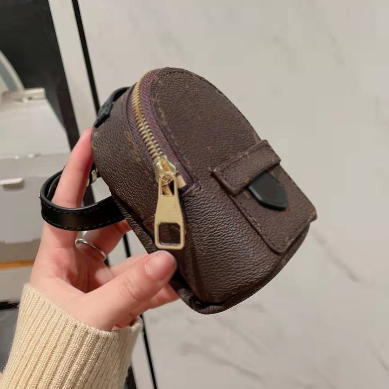 Designer Women Mini Wrist Pack Bag Luxurys Designers Bags Paris Brand Leather Backpack Design Coin Purse Lady Adjustable Bracelets Wristband Easy To Carry Wallet
Designer Women Mini Wrist Pack Bag Luxurys Designers Bags Paris Brand Leather Backpack Design Coin Purse Lady Adjustable Bracelets Wristband Easy To Carry Wallet