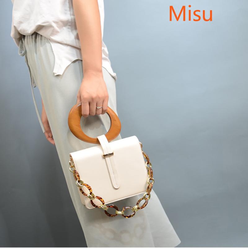 Fashion Acrylic Chain Women Shoulder Bags Designer Wooden Handle Handbags Luxury PU Leather Crossbody Bag Ladies Small Purses, Beige
Fashion Acrylic Chain Women Shoulder Bags Designer Wooden Handle Handbags Luxury PU Leather Crossbody Bag Ladies Small Purses, Beige