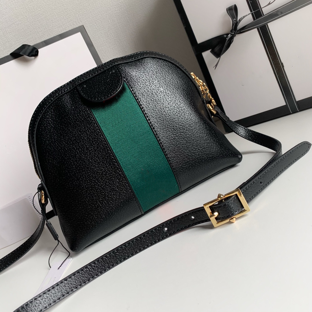 High quality women's stripe shoulder bag Good leather Shell shaped Purse Luxury Designer cross body bags Black White Classic Striped brand
High quality women's stripe shoulder bag Good leather Shell shaped Purse Luxury Designer cross body bags Black White Classic Striped brand