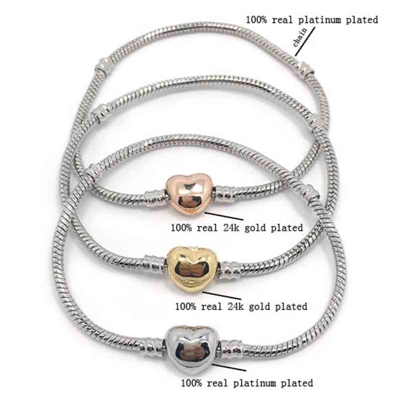 new high quality 100% plateinum plated snake chain & 24k gold heart shape clasp bracelet fit fashion pandora DIY
new high quality 100% plateinum plated snake chain & 24k gold heart shape clasp bracelet fit fashion pandora DIY