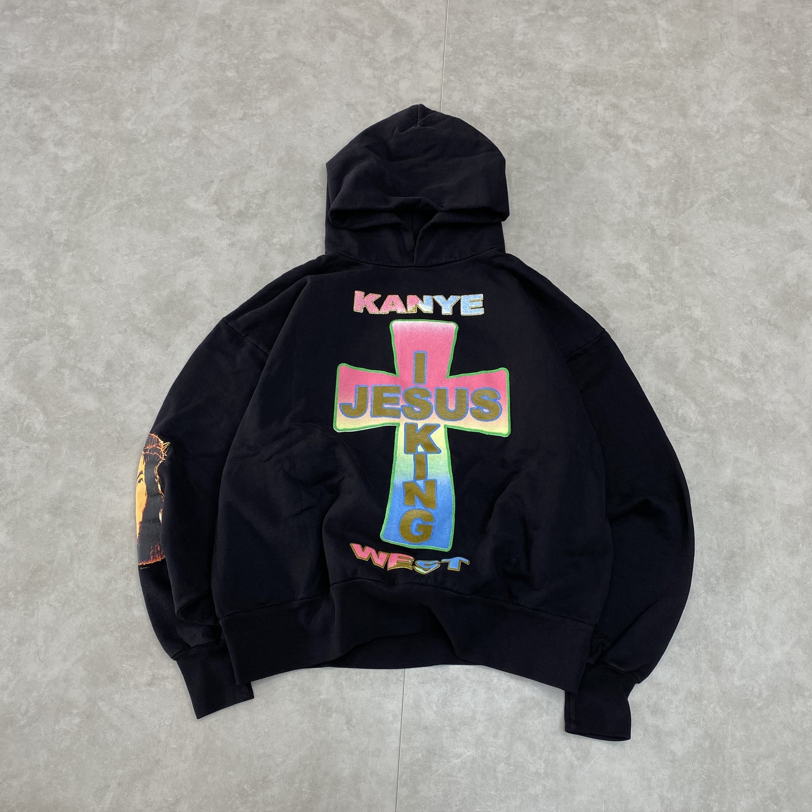 West x Asap Rocky Awge Co Branded Limited Edition God Hoodie with Powder Flash Printing, Black
West x Asap Rocky Awge Co Branded Limited Edition God Hoodie with Powder Flash Printing, Black